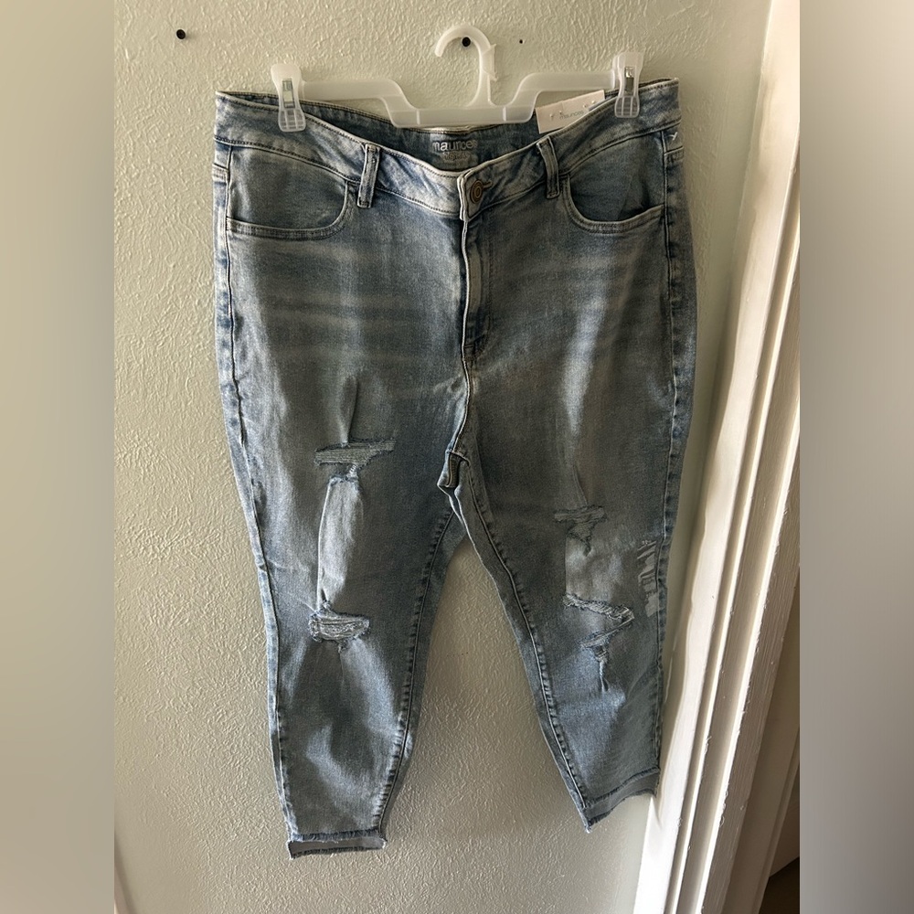 Maurice’s high-rise distressed light wash jegging. Size 20.